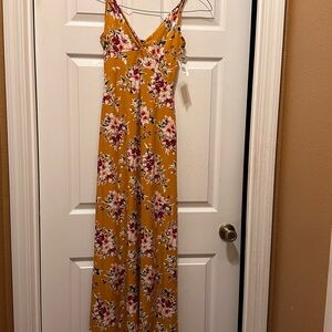 Brand New Multi color Summer Dress. Size medium.